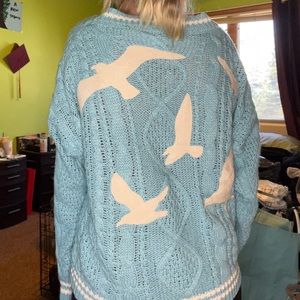 Taylor swift 1989 cardigan. Size XS/S. Never worn. Didn’t like the seagulls